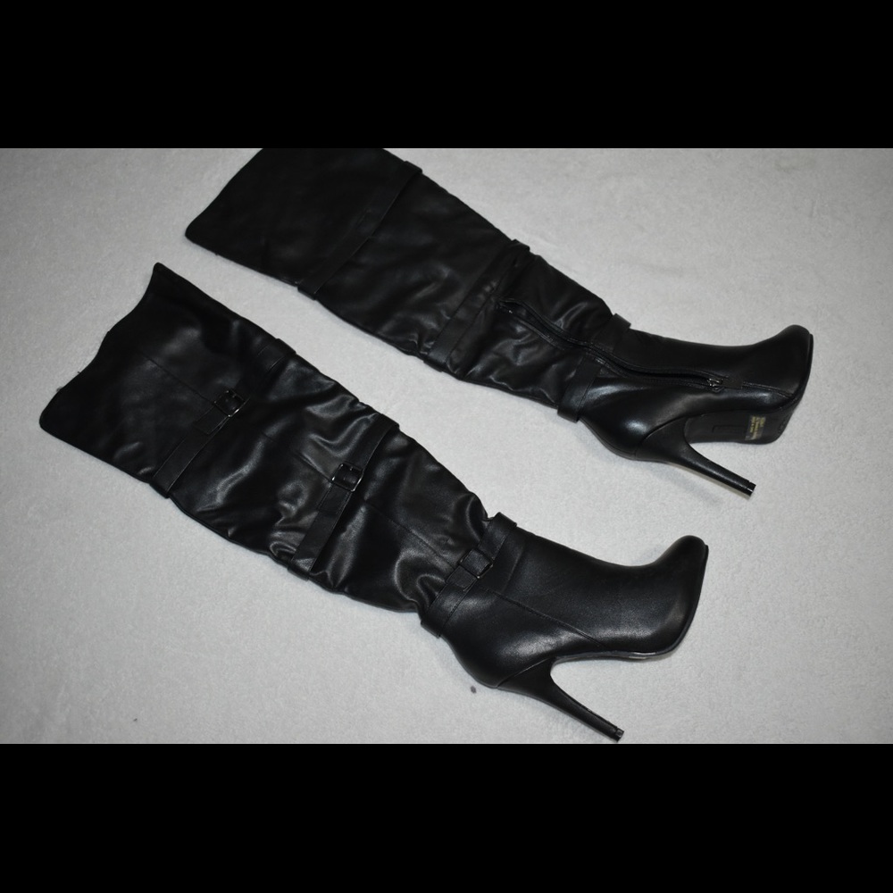 Over the knee black leather boots
